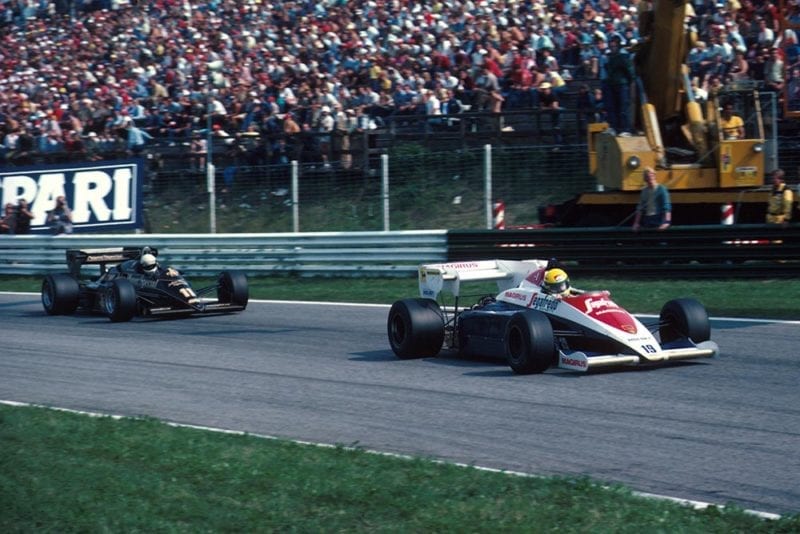 Ayrton Senna's Toleman, leading Elio de Angelis in his Lotus.