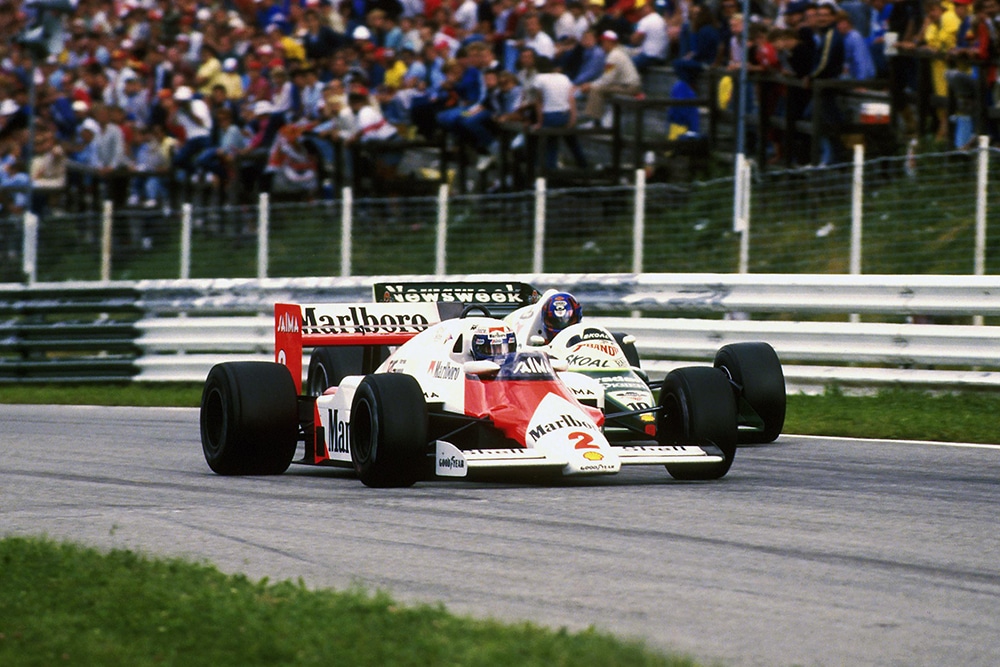 Winner Alain Prost at the wheel of his McLaren MP4/2B.
