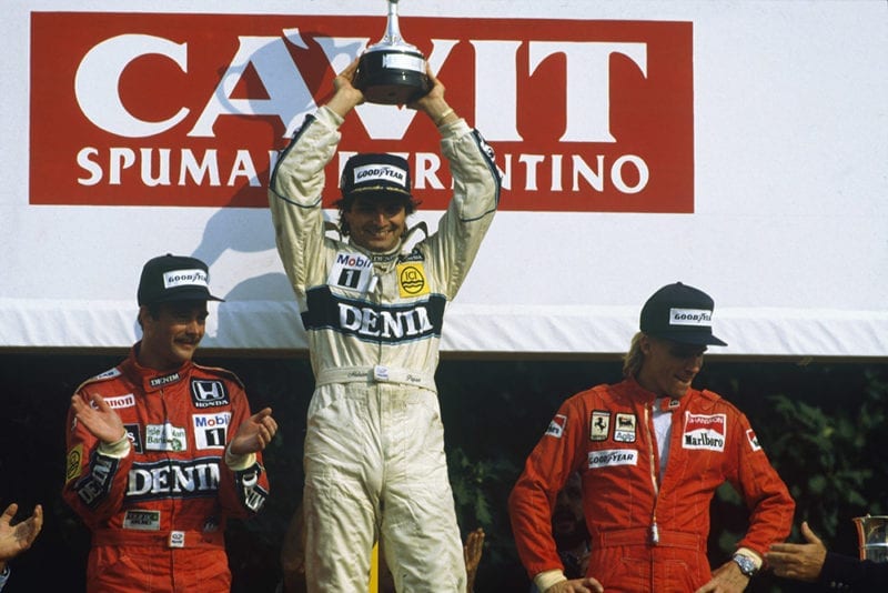 Nelson Piquet, 1st position, Nigel Mansell, 2nd position and Stefan Johansson 3rd position on the podium.