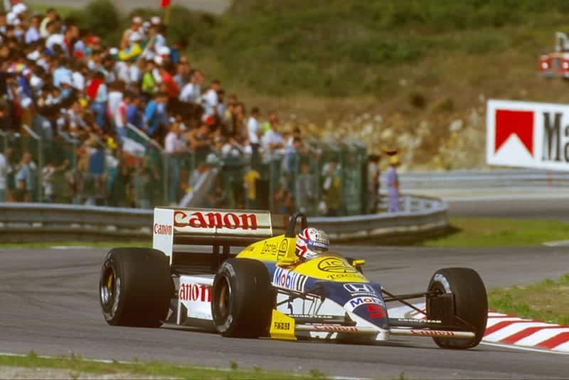Nigel Mansell at the wheel of his Williams FW11 Honda.