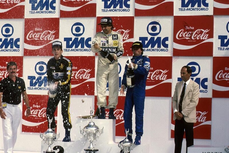 Ayrton Senna, 2nd; Nelson Piquet 1st and Jacques Laffite3rd on the podium.