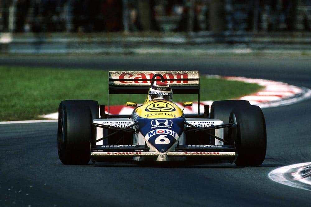 Race winner Nelson Piquet driving his Williams FW11.