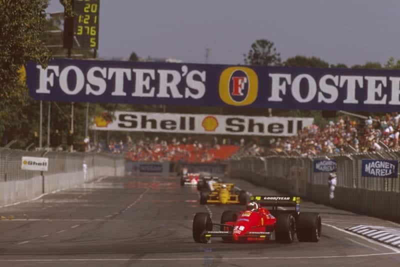 Gerhard Berger leads in his Ferrari F187.