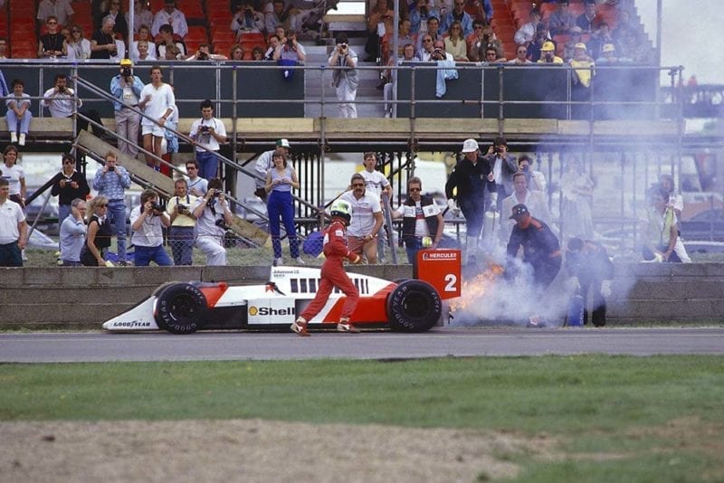 Stefan Johansson retires from the race after an engine failure caused his McLaren MP4/3 TAG Porsche to catch fire.