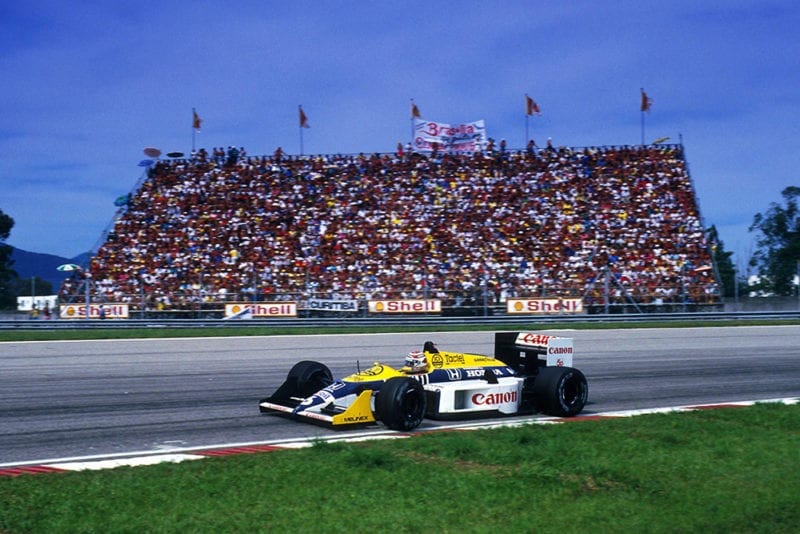 Nelson Piquet at the wheel of his Williams FW11B.