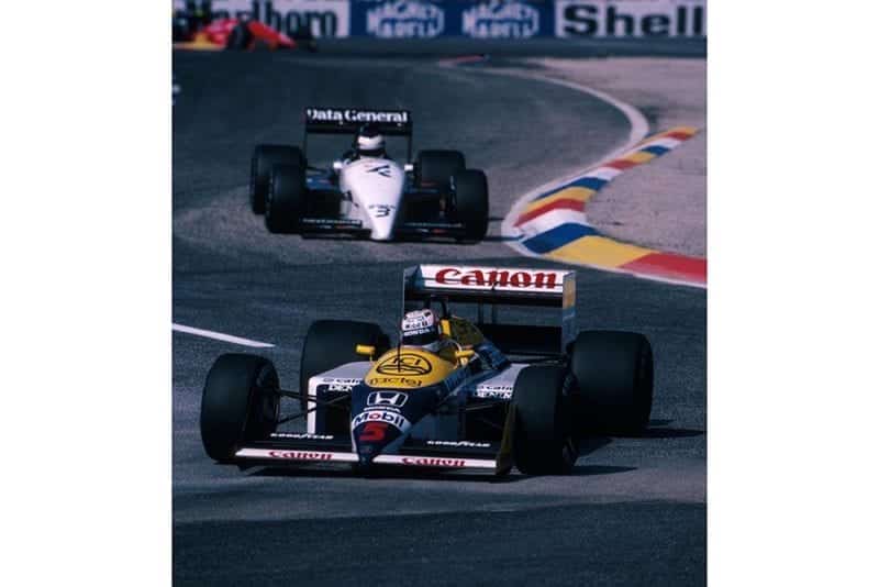 Winner Nigel Mansell in his Williams FW11B.