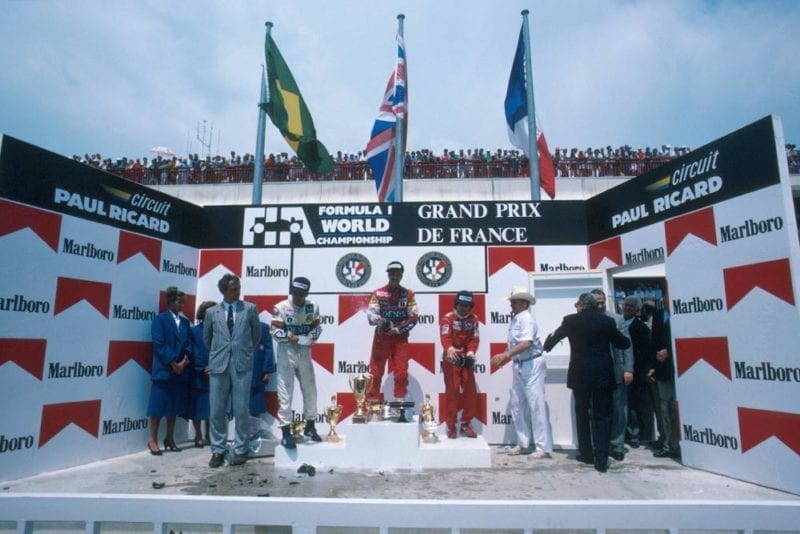 Winner Nigel Mansell, Nelson Piquet 2nd and Alain Prost 3rd on the podium.