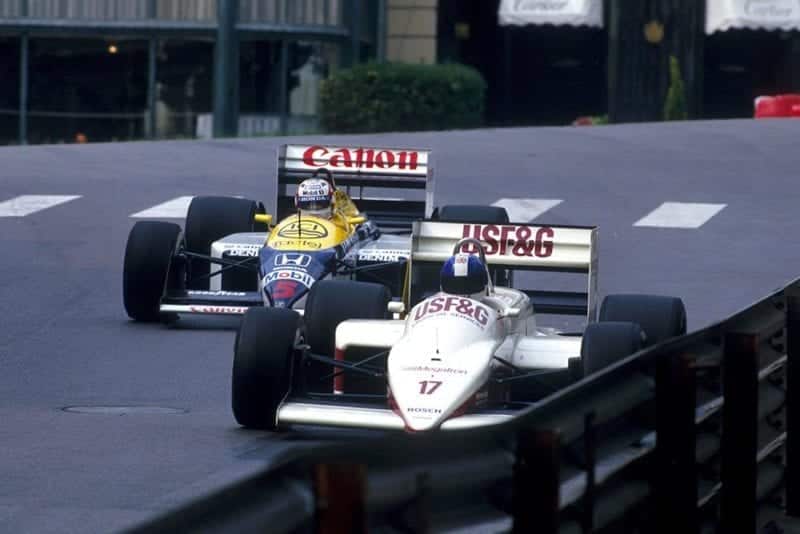 Derek Warwick (Arrows A10) leads Nigel Mansell at Casino Square.