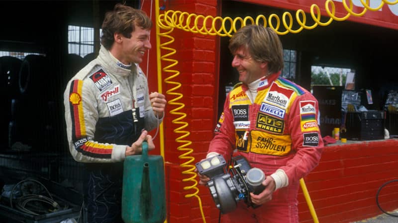 ATS-F1-driver-Manfred-Winkelhock-with-Tyrrell-driver-Stefan-Bellof-