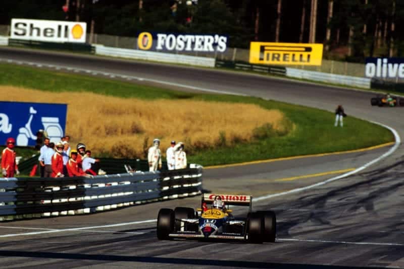 Nigel Mansell, raises his arm in victory at the Osterreichring.