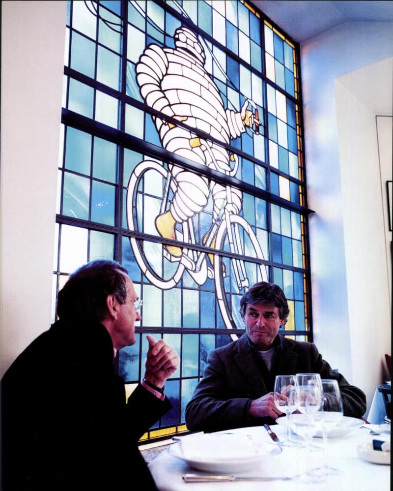 Alain de Cadenet has lunch with Simon Taylor in front of Bibendum window