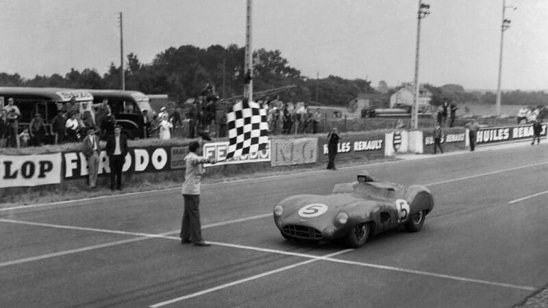 Aston Martin DBR1 of Roy Salvadori and Carroll Shelby crosses the line to win 1959 Le Mans 24 Hours