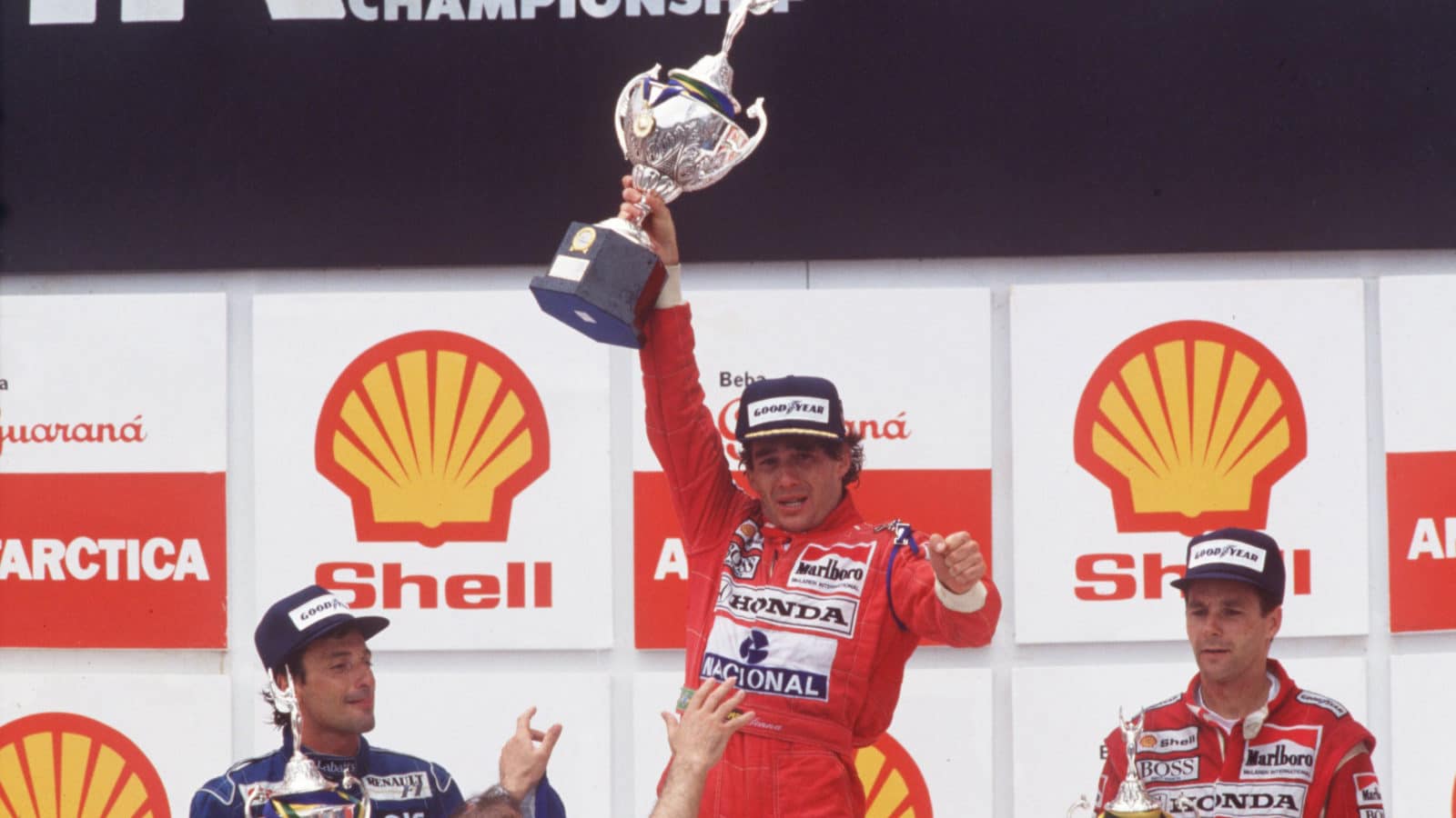 Ayrton-Senna-on-the-podium-after-winning-the-1991-Brazilian-Grand-prix