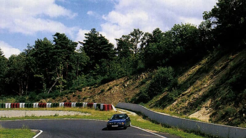 BMW 3 series powerslides at Clermont Ferrand circuit