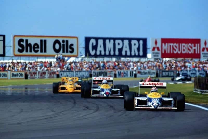 Nelson Piquet leads team mate Nigel Mansell and Ayrton Senna at the start of the race.