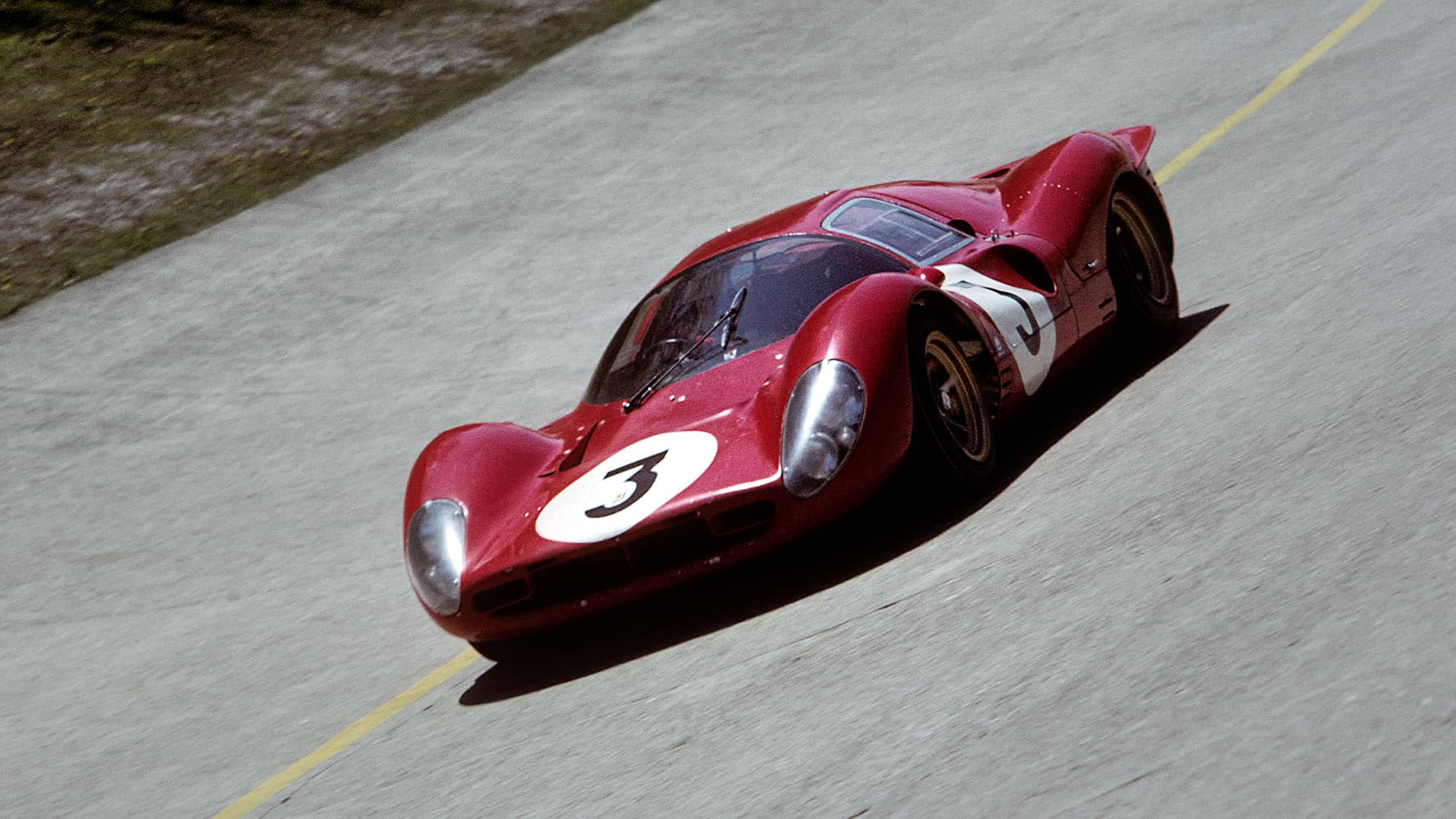 Chris Amon, Ferrari 330 P4, 1000 Km of Monza, Monza, 25 April 1967. The sublime Ferrari 330P4 on the Monza banking driven by Lorenzo Bandini. (Photo by Bernard Cahier/Getty Images)