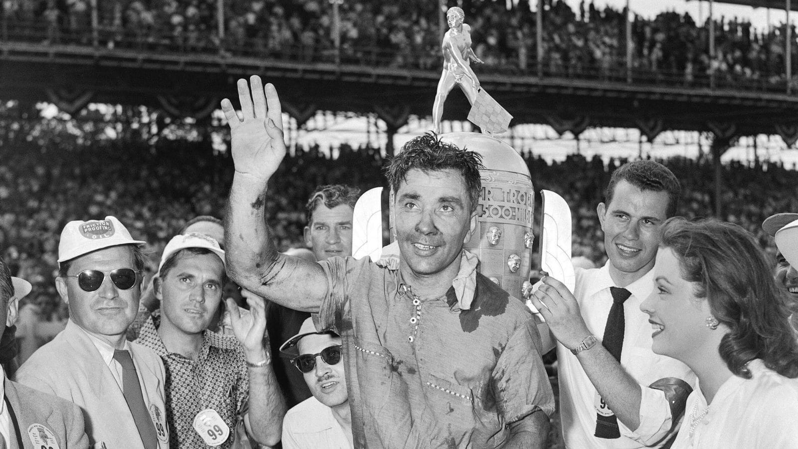 Bill Vukovich celebrates after winning the 1953 Indianapolis 500