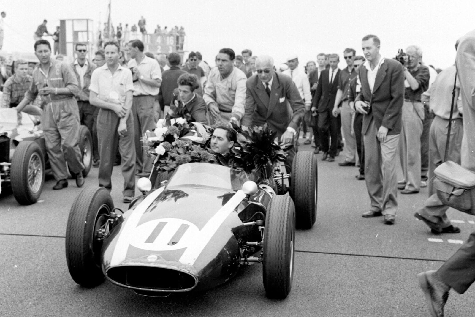 Jack Brabham takes the plaudits upon winning