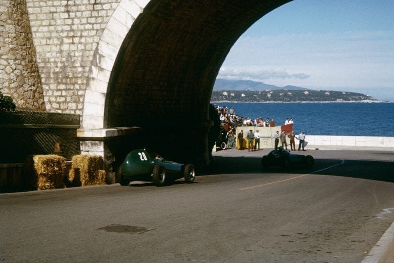 Tony Brooks and Ron Flockhart get a glimpse of the sea as they head down to the tunnel during the 1957 Monaco Grand Prix.