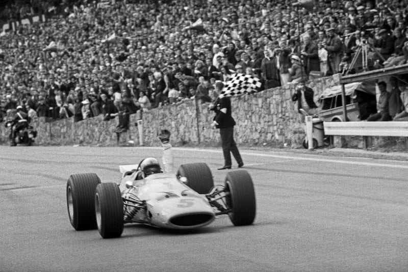 Bruce McLaren crosses the line to win the 1968 Belgian Grand Prix