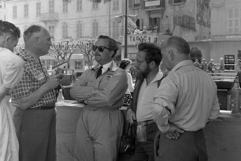 Colin Chapman talks with Denis Jenkinson at the 1958 Monaco Grand Prix