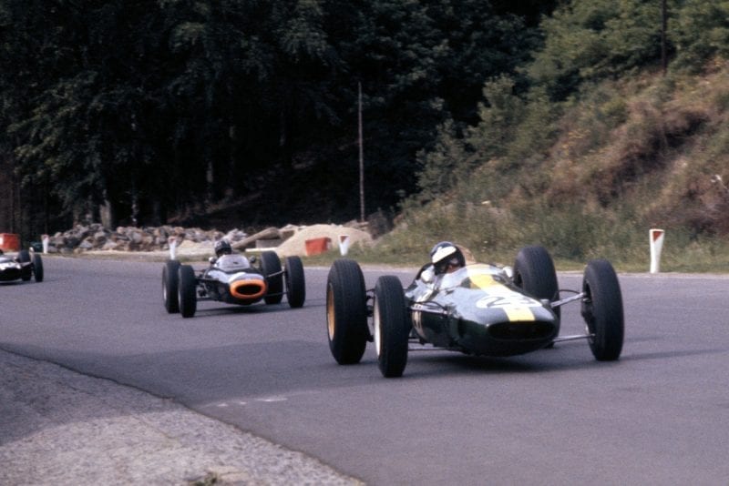 Jim Clark, Lotus 25 Climax, leads Graham Hill, BRM P261.