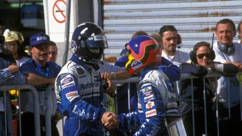 Damon Hill and Jacques Villeneuve shake hands after the 1996 Argentine Grand Prix