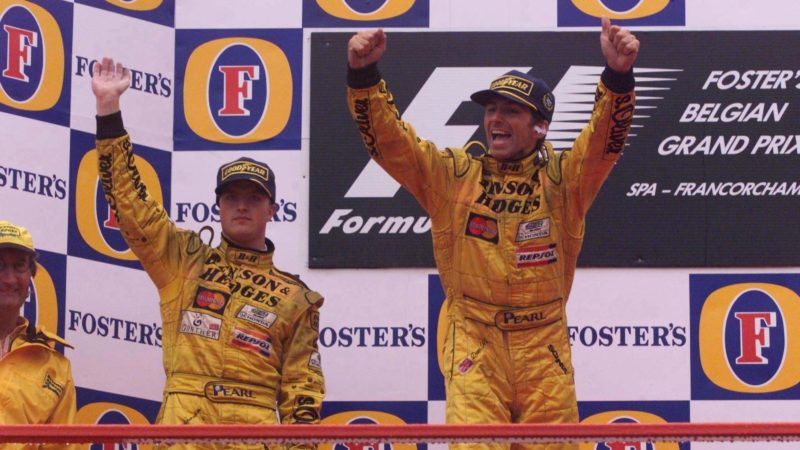 Damon Hill celebrates on the podium in Spa 1998