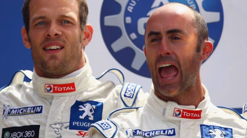 David Brabham and Alex Wurz celebrate on Le Mans podium