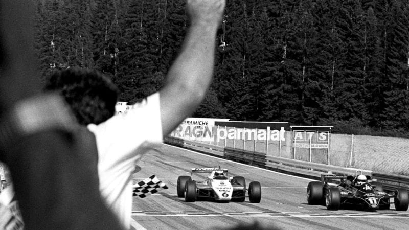 Elio de Angelis, Keke Rosberg, Lotus-Ford 91, Williams-Ford FW08, Grand Prix of Austria, Red Bull Ring, Spielberg, Austria, August 15, 1982. Elio de Angelis crosses the finish line just ahead of Keke Rosberg, and takes victory. (Photo by Bernard Cahier/Getty Images)