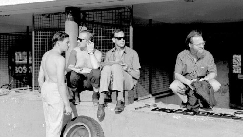 Denis Jenkinson with Jim Clark and Colin Chapman in the Monza pitlane in 1963