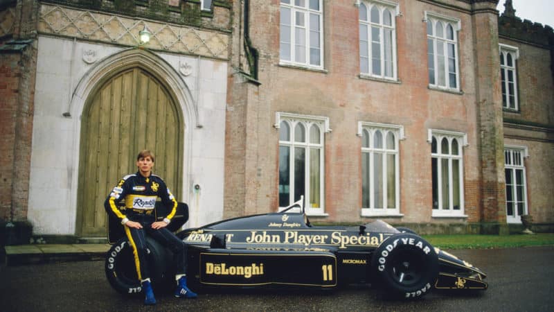 Racing driver Johnny Bute ,Marquess of Bute aka Johnny Crichton-Stuart and Johnny Dumfries drives poses with the John Player Special Lotus-Renault 98Tat Ketteringham Hall the home of Lotus cars January 1986 at Ketteringham Hall in Ketteringham, Great Britain. (Photo by Simon Miles/Getty Images)