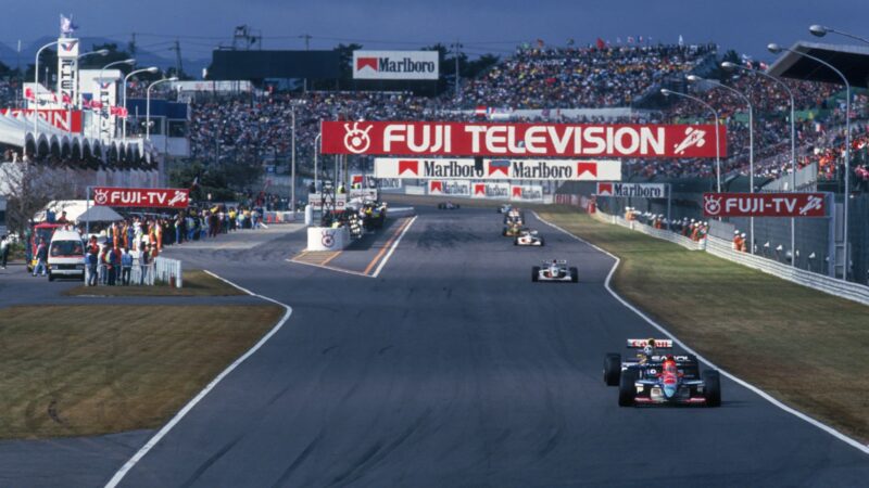 Eddie Irvine's Jordan ahead of Damon Hill's Williams at Suzuka in the 1993 Japanese Grand Prix