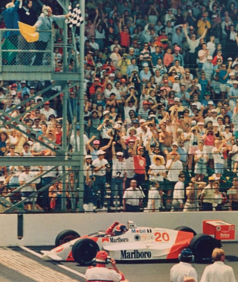 Emerson-Fittipaldi-crosses-the-line-to-win-the-1989-Indy-500