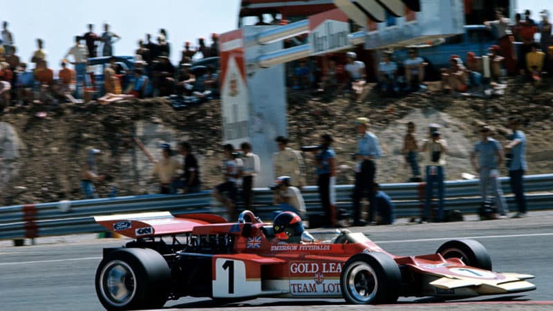 Emerson Fittipaldi drives underneath an electronic gantry in the 1971 French Grand Prix