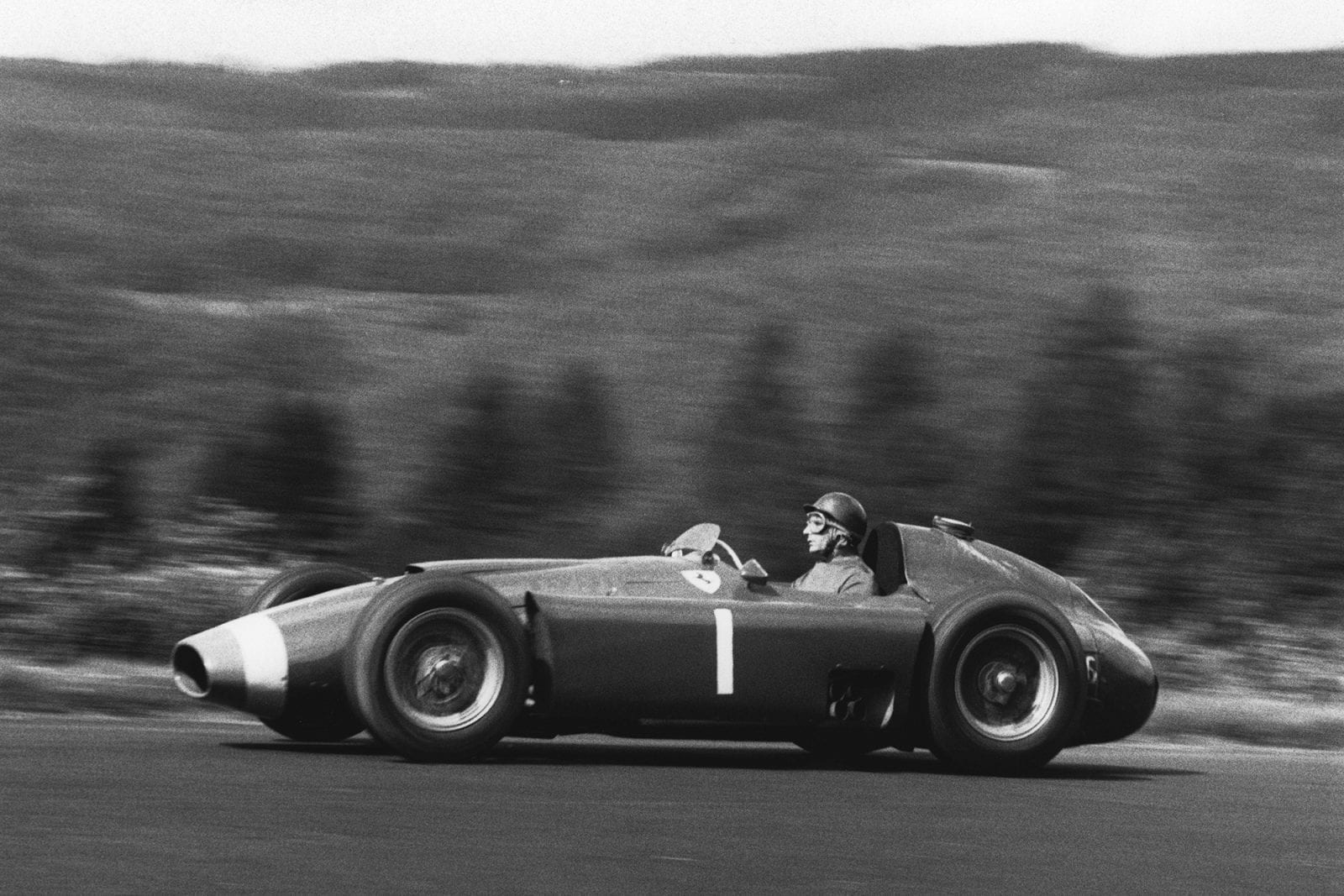 1956 German Grand Prix race winner Juan Manuel Fangio (Lancia ferrari D50), Nurburgring, Germany.