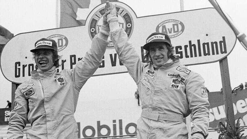 Francois Cevert on podium with Jackie Stewart at 1972 German Grand Prix