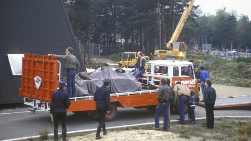 Gilles Villeneuves wrecked Ferrari is removed from the Zolder circuit in 1982