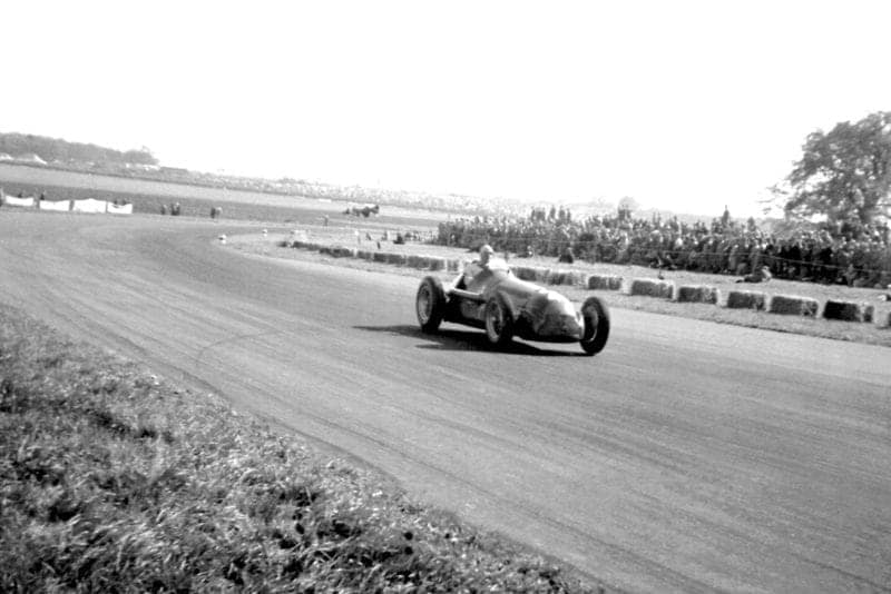 Giuseppe Farina at Abbey Curve in the 1950 British Grand Prix at Silverstone