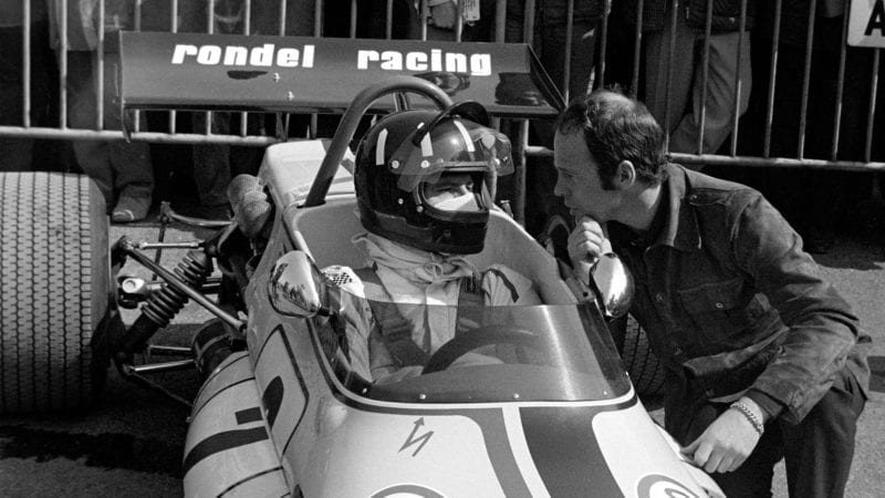 Graham Hill in Rondel Racing car talks to Peter Gethin