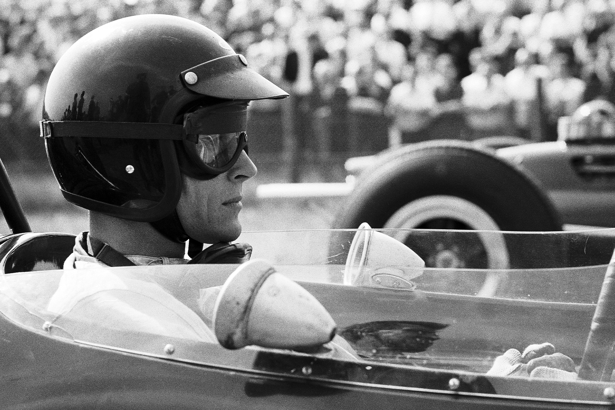 Dan Gurney awaits the start of the race in his Brabham