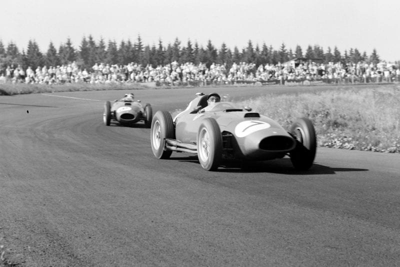 Peter Collins, Ferrari D50, leads Mike Hawthorn, Ferrari D50 at the 1957 German Grand Prix, Nurburgring.
