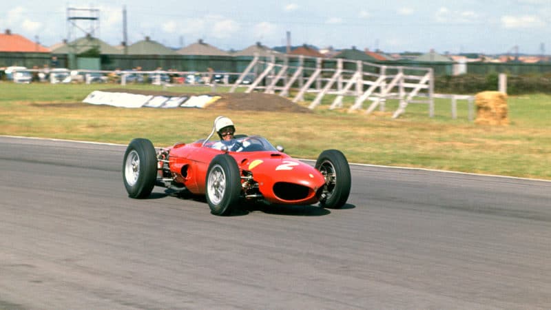 1961 Phil Hill driving a Ferrari 156 at Aintree, British GP 2nd. (Photo by: GP Library/Universal Images Group via Getty Images)