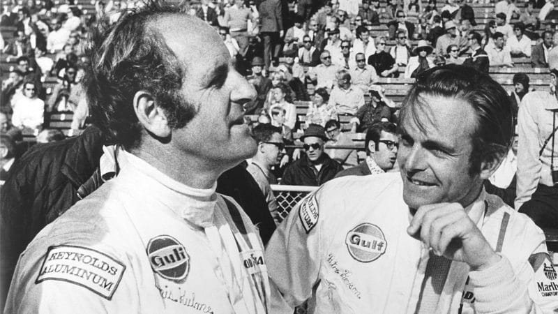 UNKNOWN — 1971: Denis Hulme (L) and Peter Revson (R) were teammates on the potent McLaren team during the year on the SCCA Can-Am circuit. Revson went on to win the season championship. Hulme also won the Can-Am title in both 1968 and 1970. (Photo by ISC Images & Archives via Getty Images)
