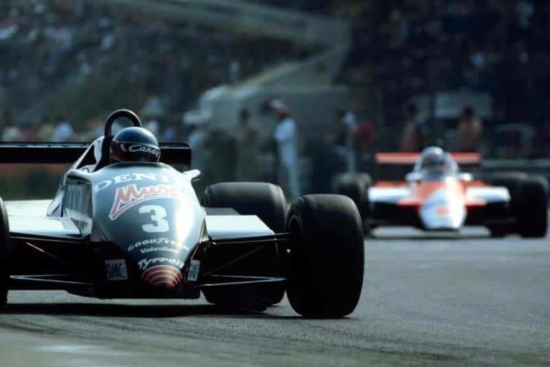 Michele Alboreto in his Tyrrell Ford behind race winner, Rene Arnoux.