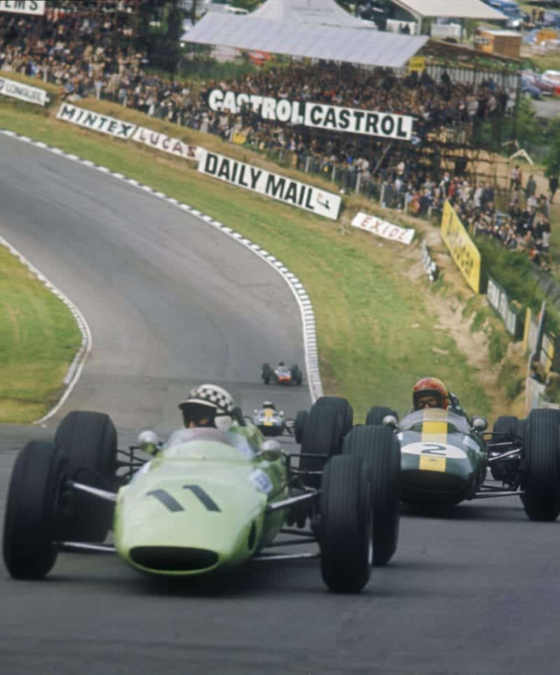 Innes-Ireland-leads-Mike-Spence-at-the-1964-British-Grand-Prix-at-Brands-Hatch