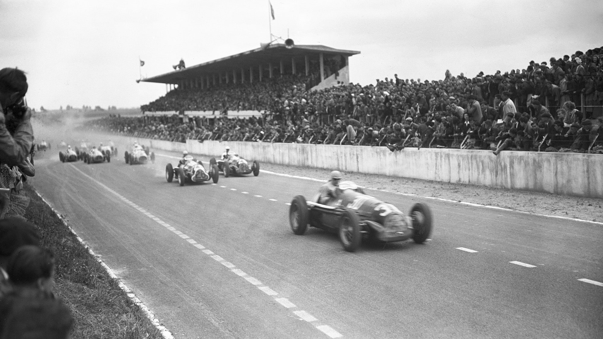 Jean-Pierre Wimille leads in his Alfa Romeo 158 at Reims-Gueux in 1948