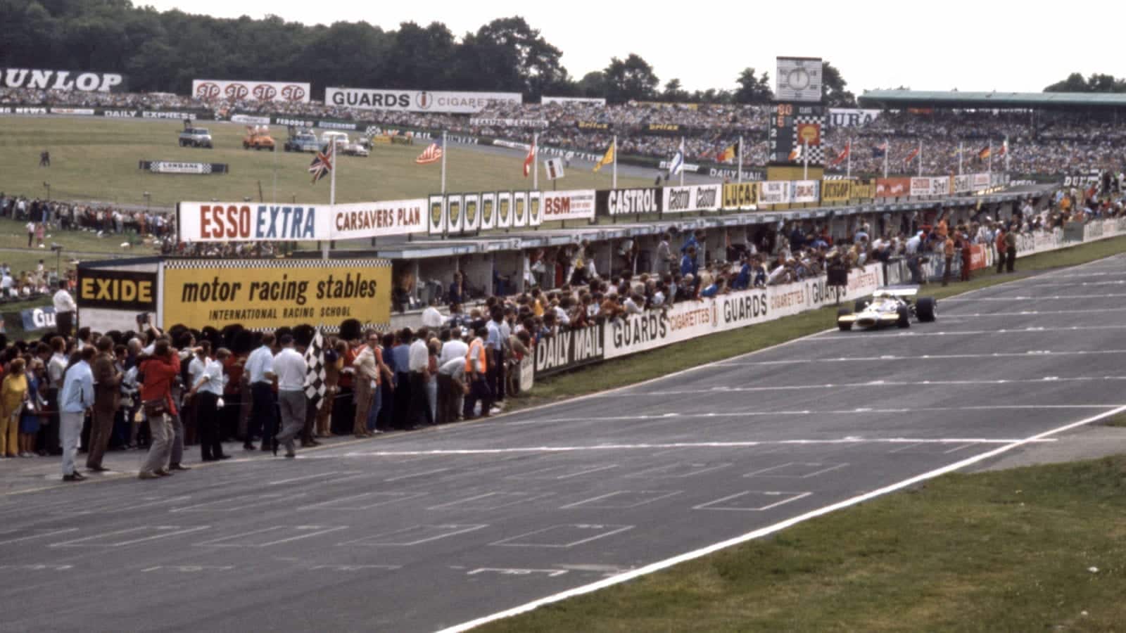 Jack Brabham coasts to the finish line at Brands Hatch to take second place at the 1970 British Grand Prix