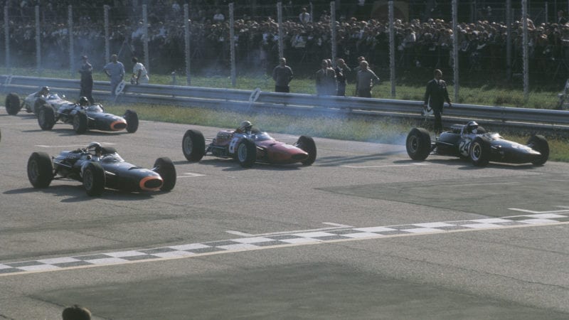 Jackie Stewart, John Surtees and Jim Clark on the front row at Monza for the start of the 1965 Italian Grand Prix