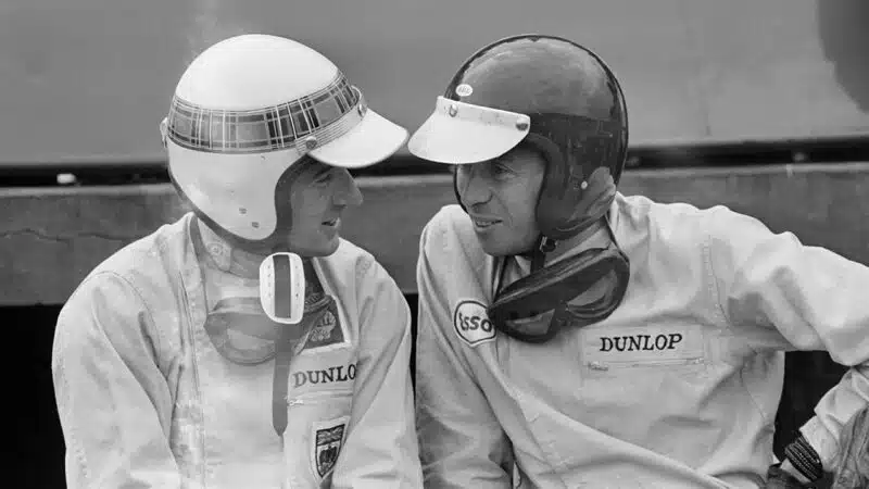 Jackie Stewart and Jim Clark talking at Silverstone in 1965